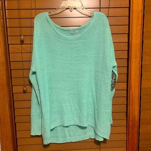 Mint green sweater with gold sequin elbow patches